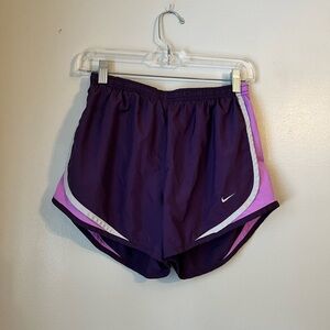 Nike dri-fit running shorts dark and light purple rounded hem built in underwear